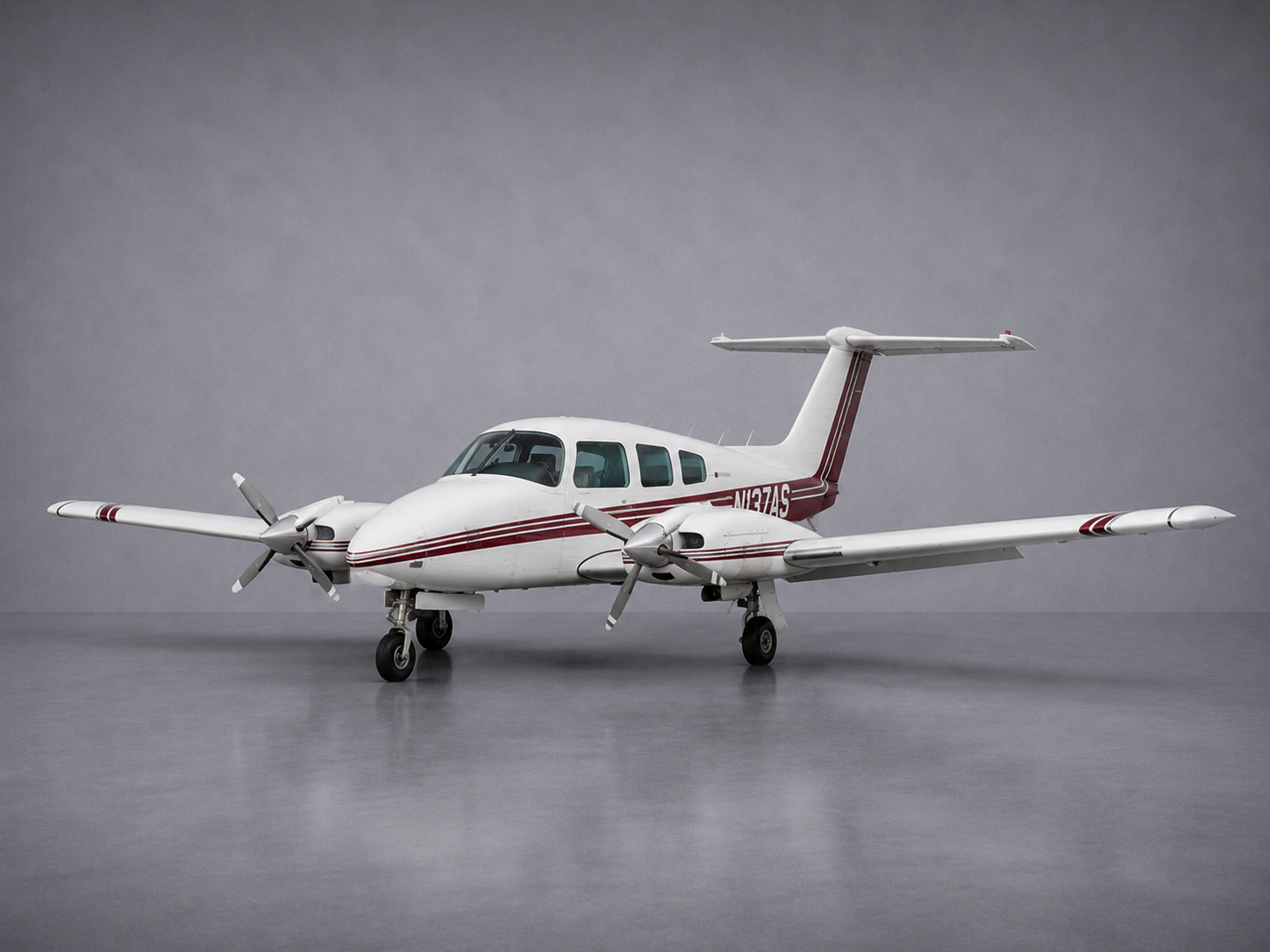 Beechcraft BE-76 Duchess N137AS twin-engine trainer with counter-rotating propellers on the KFXE ramp in Fort Lauderdale